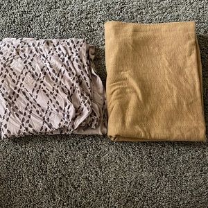 Two Kate Quinn receiving blankets